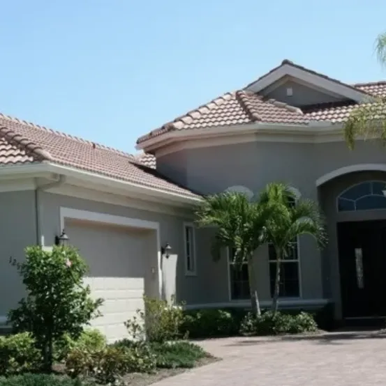 Tile roof home with seamless gutter protection