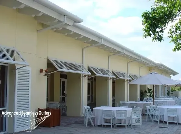 Restaurant storefront with seamless gutter installation